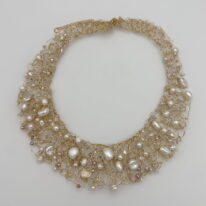 Gold-Fill Crochet Collar with Freshwater Pearls by Veronica Stewart at The Avenue Gallery, a contemporary fine art gallery in Victoria, BC, Canada.