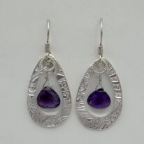 Fine Silver Textured Open Teardrops Earrings with Amethyst by Veronica Stewart at The Avenue Gallery, a contemporary fine art gallery in Victoria, BC, Canada.