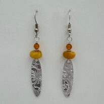 Fine Silver Textured Ovals Earrings with Amber by Veronica Stewart at The Avenue Gallery, a contemporary fine art gallery in Victoria, BC, Canada.