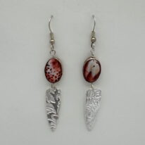 Fine Silver Textured Shields Earrings with Red Oyster Shell by Veronica Stewart at The Avenue Gallery, a contemporary fine art gallery in Victoria, BC, Canada.