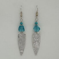 Fine Silver Textured Shields with Topaz by Veronica Stewart at The Avenue Gallery, a contemporary fine art gallery in Victoria, BC, Canada.