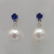 Tanzanite & White Pearl Earrings with Sterling Silver Settings by Val Nunns at The Avenue Gallery, a contemporary fine art gallery in Victoria, BC, Canada.