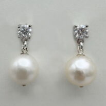 White Pearl & Lab Grown Diamond Earrings by Val Nunns at The Avenue Gallery, a contemporary fine art gallery in Victoria, BC, Canada.