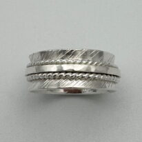 Spinner Ring with Etched Texture by A & R Jewellery at The Avenue Gallery, a contemporary fine art gallery in Victoria, BC, Canada.