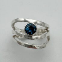 Wind Design Ring with London Topaz by A & R Jewellery at The Avenue Gallery, a contemporary fine art gallery in Victoria, BC, Canada.