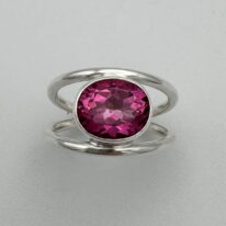 Round Double-Band Ring with Pink Topaz by A & R Jewellery at The Avenue Gallery, a contemporary fine art gallery in Victoria, BC, Canada.