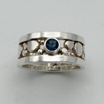 Flat Granules Ring with London Topaz by A & R Jewellery at The Avenue Gallery, a contemporary fine art gallery in Victoria, BC, Canada.