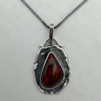 Wax Seal Pendant with Black Opal by A & R Jewellery at The Avenue Gallery, a contemporary fine art gallery in Victoria, BC, Canada.