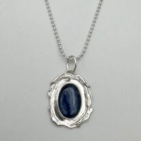 Wax Seal Pendant with Kyanite by A & R Jewellery at The Avenue Gallery, a contemporary fine art gallery in Victoria, BC, Canada.