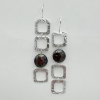 Hollow Squares Earrings with Purple Pearls by A & R Jewellery at The Avenue Gallery, a contemporary fine art gallery in Victoria, BC, Canada.