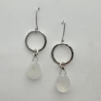 Hammered Sun Earrings with Moonstone by A & R Jewellery at The Avenue Gallery, a contemporary fine art gallery in Victoria, BC, Canada.