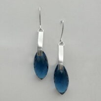 Curved Bar Earrings with London Blue Topaz by A & R Jewellery at The Avenue Gallery, a contemporary fine art gallery in Victoria, BC, Canada.