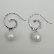 Shell Pearl Earrings with Sterling Silver Wires by Val Nunns at The Avenue Gallery, a contemporary fine art gallery in Victoria, BC, Canada.