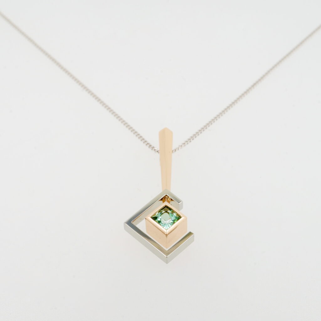 Green Tourmaline Pendant by Bayot Heer at The Avenue Gallery, a contemporary fine art gallery in Victoria, BC, Canada.