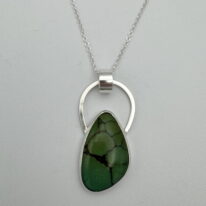 Argentium Silver Horseshoe Pendant with Turquoise by A & R Jewellery at The Avenue Gallery, a contemporary fine art gallery in Victoria, BC, Canada.