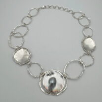 Free Form Circle Argentium Silver Necklace with Pearl Blister by A & R Jewellery at The Avenue Gallery, a contemporary fine art gallery in Victoria, BC, Canada.