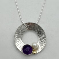 Hammered Wreath Pendant with Amethyst & 18kt. Gold by Chi's Creations at The Avenue Gallery, a contemporary fine art gallery in Victoria, BC, Canada.