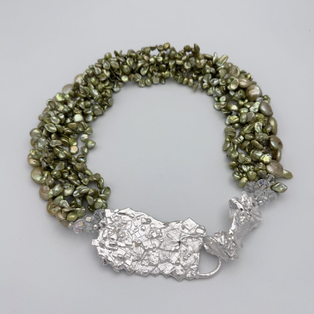 Green Keshi Pearl Necklace by Barbara Adams at The Avenue Gallery, a contemporary fine art gallery in Victoria, BC, Canada.