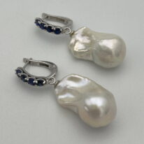 White Baroque Pearl and Blue Sapphire Earrings by Val Nunns at The Avenue Gallery, a contemporary fine art gallery in Victoria, BC, Canada.
