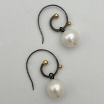 White Freshwater Pearl & Oxidized Curly Wire Earrings by Val Nunns at The Avenue Gallery, a contemporary fine art gallery in Victoria, BC, Canada.