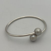 Sterling Silver Flex Bracelet with Freshwater Pearls by Val Nunns at The Avenue Gallery, a contemporary fine art gallery in Victoria, BC, Canada.