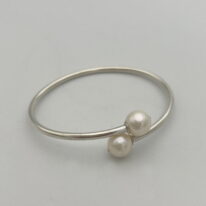 Sterling Silver Flex Bracelet with Freshwater Pearls by Val Nunns at The Avenue Gallery, a contemporary fine art gallery in Victoria, BC, Canada.