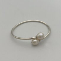 Sterling Silver Flex Bracelet with Freshwater Pearls by Val Nunns at The Avenue Gallery, a contemporary fine art gallery in Victoria, BC, Canada.