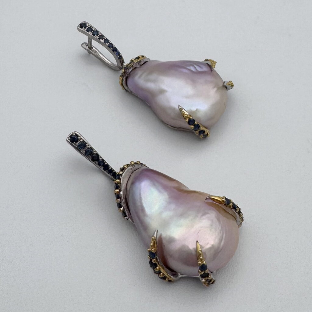 Baroque Pearl & Blue Sapphire Earrings by Val Nunns at The Avenue Gallery, a contemporary fine art gallery in Victoria, BC, Canada.