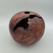 Arbutus Burl Hollow Form by Robert Wilman at The Avenue Gallery, a contemporary fine art gallery in Victoria, BC, Canada.