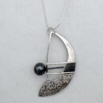 Balanced Sail Necklace by Chi's Creations at The Avenue Gallery, a contemporary fine art gallery in Victoria, BC, Canada.