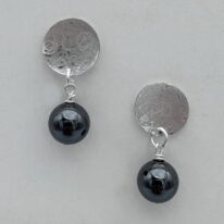 Scribbled Round Disc Earrings with Hematite by Chi's Creations at The Avenue Gallery, a contemporary fine art gallery in Victoria, BC, Canada.