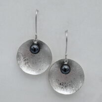 Scribbled Large Shell Disc Earrings with Hematite by Chi's Creations at The Avenue Gallery, a contemporary fine art gallery in Victoria, BC, Canada.