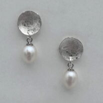 Balanced Scribbled Disc Dangle Earrings with White Pearls by Chi’s Creations at The Avenue Gallery, a contemporary fine art gallery in Victoria, BC, Canada.