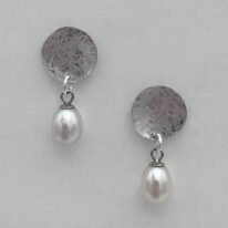 Balanced Scribbled Disc Dangle Earrings with White Pearls by Chi’s Creations at The Avenue Gallery, a contemporary fine art gallery in Victoria, BC, Canada.