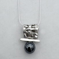 Woven Basket Necklace with Hematite by Chi’s Creations at The Avenue Gallery, a contemporary fine art gallery in Victoria, BC, Canada.