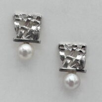 Woven Pearl Stud Earrings by Chi’s Creations at The Avenue Gallery, a contemporary fine art gallery in Victoria, BC, Canada.