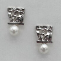 Woven Pearl Stud Earrings by Chi’s Creations at The Avenue Gallery, a contemporary fine art gallery in Victoria, BC, Canada.