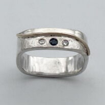 Medium Wave Ring with Sapphire and Diamond by Chi’s Creations at The Avenue Gallery, a contemporary fine art gallery in Victoria, BC, Canada.