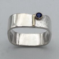 Large Square Ring with 14kt Gold Bar and Sapphire by Chi’s Creations at The Avenue Gallery, a contemporary fine art gallery in Victoria, BC, Canada.