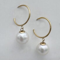 Round Freshwater Pearl on Gold-Filled Hoop Earrings by Val Nunns at The Avenue Gallery, a contemporary fine art gallery in Victoria, BC, Canada.