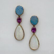 Australian Opal, Ruby & Ethiopian Opal Earrings by Val Nunns at The Avenue Gallery, a contemporary fine art gallery in Victoria, BC, Canada.