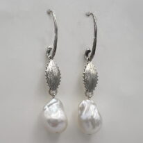 Freshwater Pearl Earrings with Sterling Silver Charms and Wires by Val Nunns at The Avenue Gallery, a contemporary fine art gallery in Victoria, BC, Canada.
