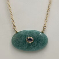 Amazonite Pendant with Amethyst Inlay by Val Nunns at The Avenue Gallery, a contemporary fine art gallery in Victoria, BC, Canada.