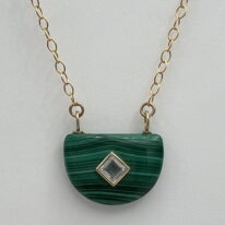 Malachite Pendant with Blue Topaz Inlay by Val Nunns at The Avenue Gallery, a contemporary fine art gallery in Victoria, BC, Canada.