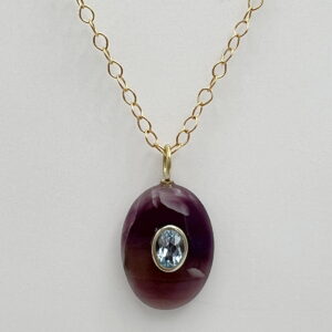 Rose Quartz Pendant with Blue Topaz Inlay by Val Nunns at The Avenue Gallery, a contemporary fine art gallery in Victoria, BC, Canada.