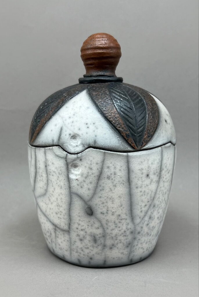 Naked Raku Lidded Jar by Jan Lovewell at The Avenue Gallery, a contemporary fine art gallery in Victoria, BC, Canada.