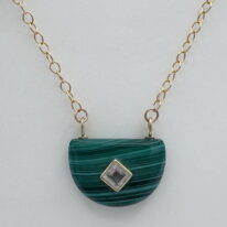 Malachite Pendant with White Topaz Inlay by Val Nunns at The Avenue Gallery, a contemporary fine art gallery in Victoria, BC, Canada.
