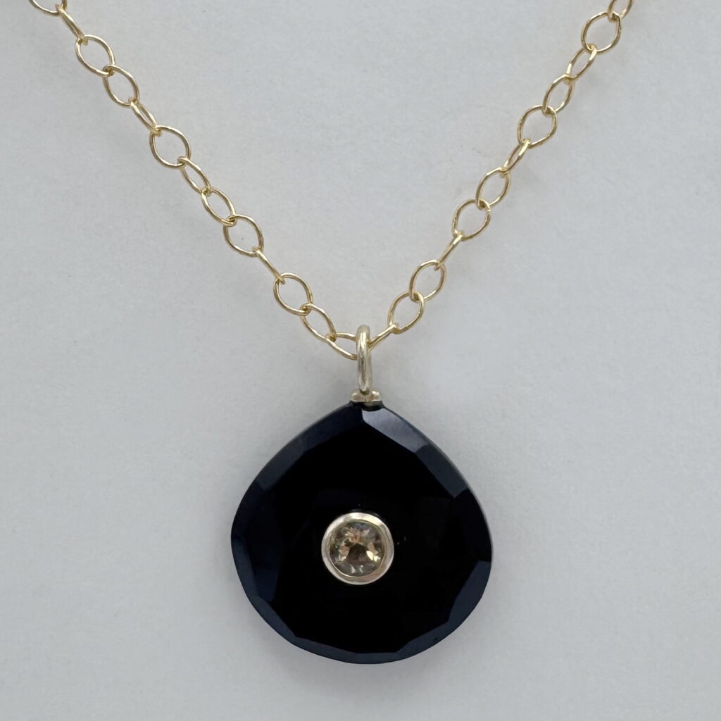 Onyx Pendant with Citrine Inlay by Val Nunns at The Avenue Gallery, a contemporary fine art gallery in Victoria, BC, Canada.