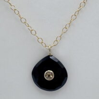 Onyx Pendant with Citrine Inlay by Val Nunns at The Avenue Gallery, a contemporary fine art gallery in Victoria, BC, Canada.