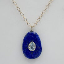 Lapis Pendant with Blue Topaz Inlay by Val Nunns at The Avenue Gallery, a contemporary fine art gallery in Victoria, BC, Canada.